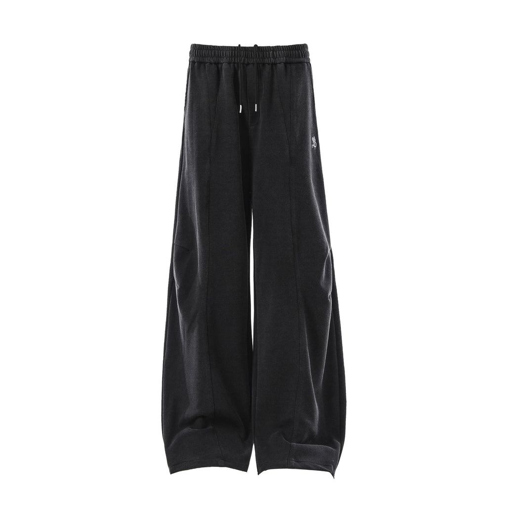 Minimally embroidered deconstructive sweatpants