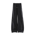 Minimally embroidered deconstructive sweatpants