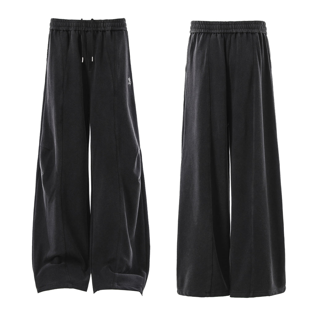 Minimally embroidered deconstructive sweatpants
