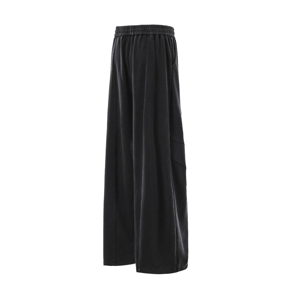 Minimally embroidered deconstructive sweatpants
