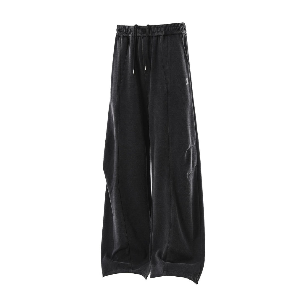 Minimally embroidered deconstructive sweatpants
